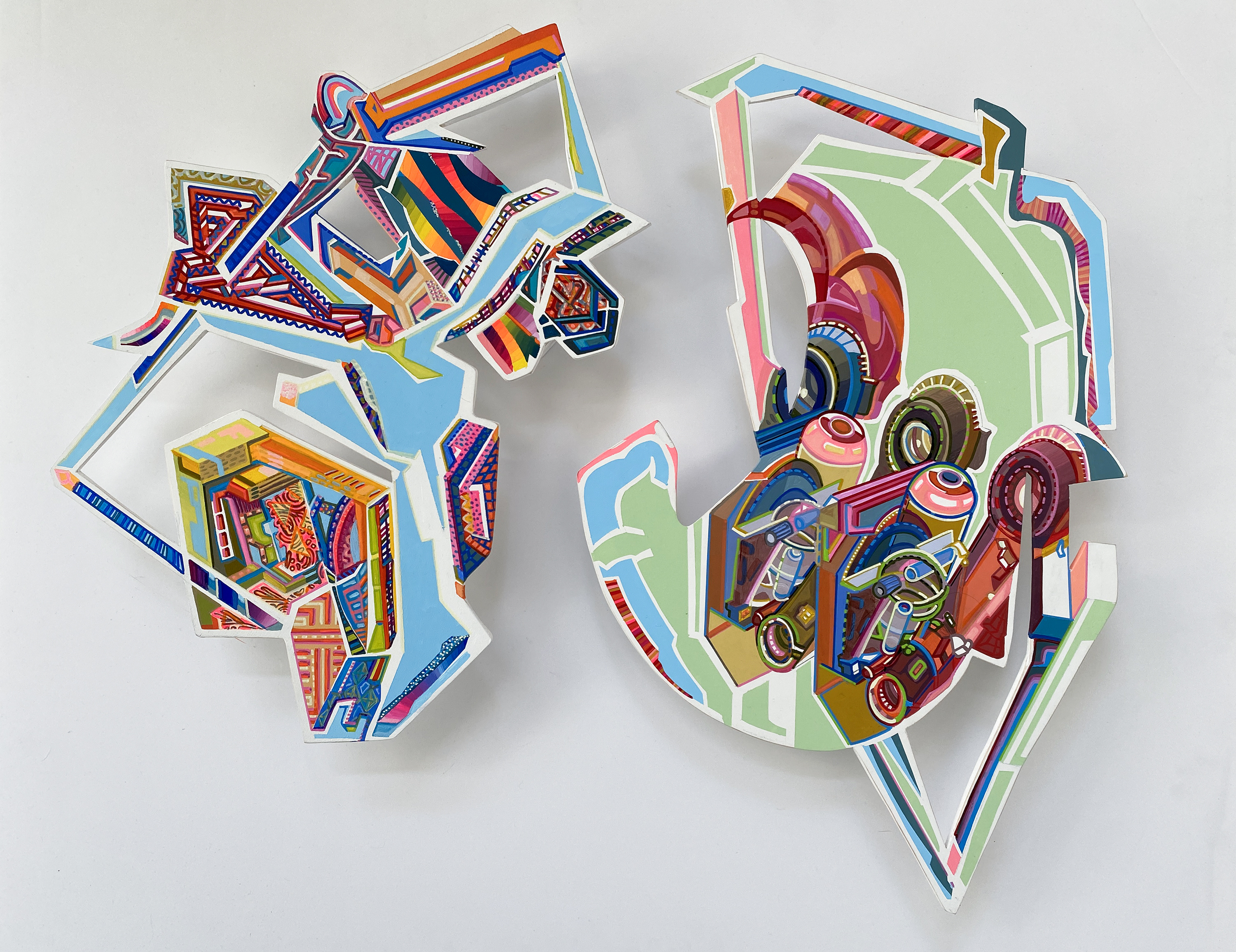 Work by Ema Harris Sintamarian Two abstract two-dimmensional colorful shapes on a white background