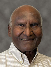 color headshot of Dr. Raghu Agarwal
