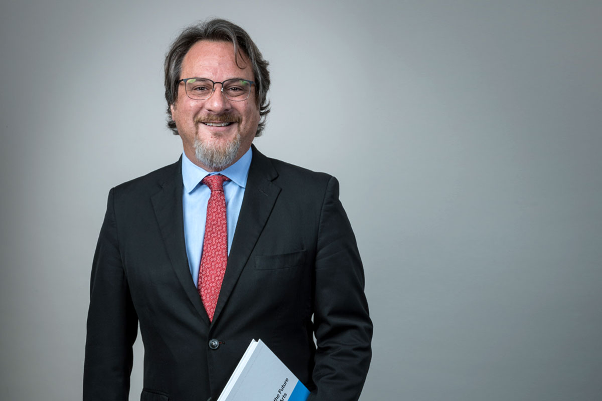 Vin DelCasino with a book.